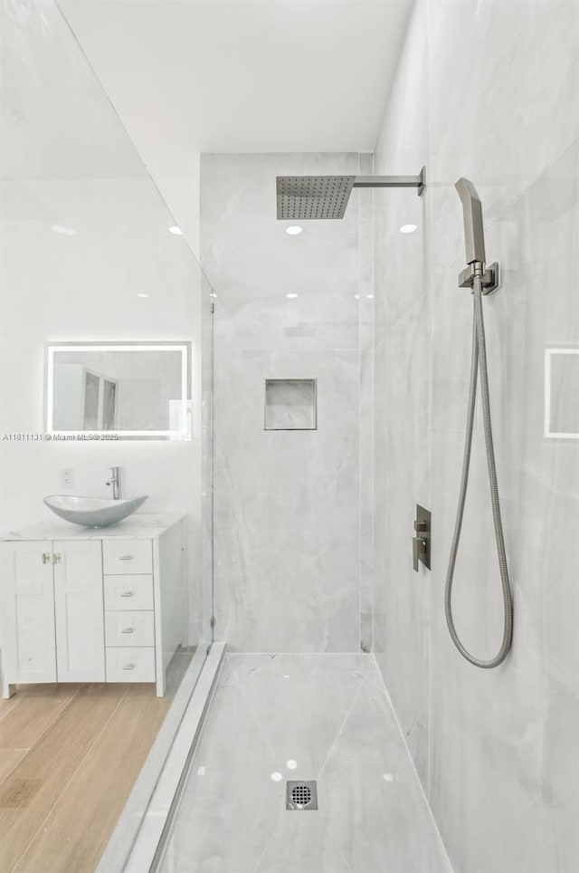 2001 SW 23rd Ave, Fort Lauderdale, FL 33312 - full bath featuring a marble finish shower, vanity, and wood finished floors