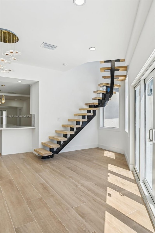 2001 SW 23rd Ave, Fort Lauderdale, FL 33312 - staircase with wood finished floors, baseboards, and recessed lighting