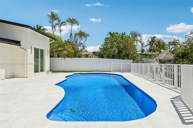 2001 SW 23rd Ave, Fort Lauderdale, FL 33312 - view of swimming pool featuring a patio area and a fenced backyard