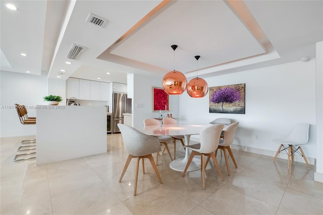 2 Grove Isle Dr Unit B1108, Miami, FL 33133 - dining space featuring a tray ceiling and light tile patterned floors