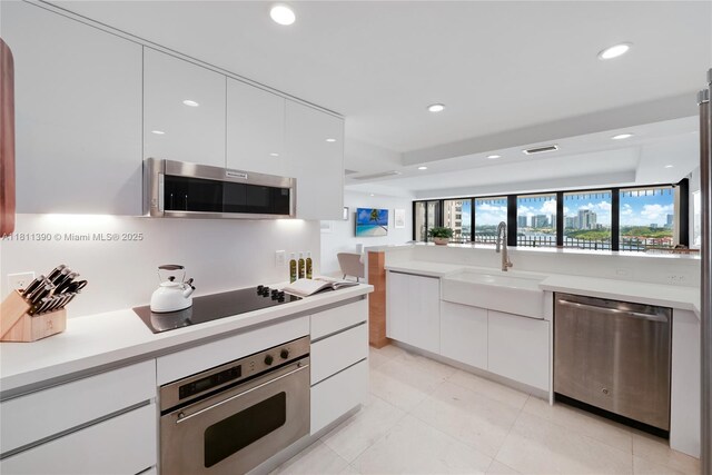 2 Grove Isle Dr Unit B1108, Miami, FL 33133 - bathroom featuring vanity, toilet, and a shower with door