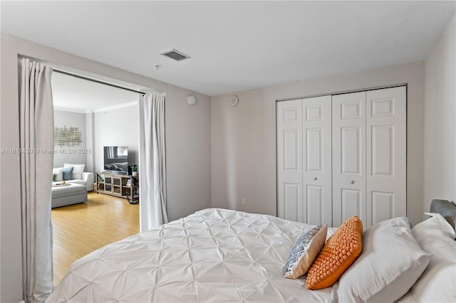 2000 N Bayshore Dr Unit 401, Miami, FL 33137 - bedroom with wood finished floors and a closet