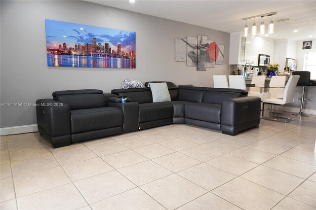721 NW 105th Ter Unit 721, Pembroke Pines, FL 33026 - living room with light tile patterned flooring, track lighting, a skyline view, and recessed lighting