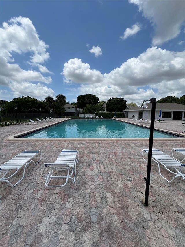 721 NW 105th Ter Unit 721, Pembroke Pines, FL 33026 - community pool with a patio area