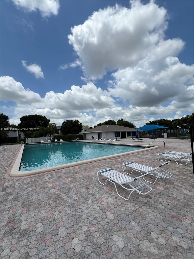 721 NW 105th Ter Unit 721, Pembroke Pines, FL 33026 - community pool featuring a patio area