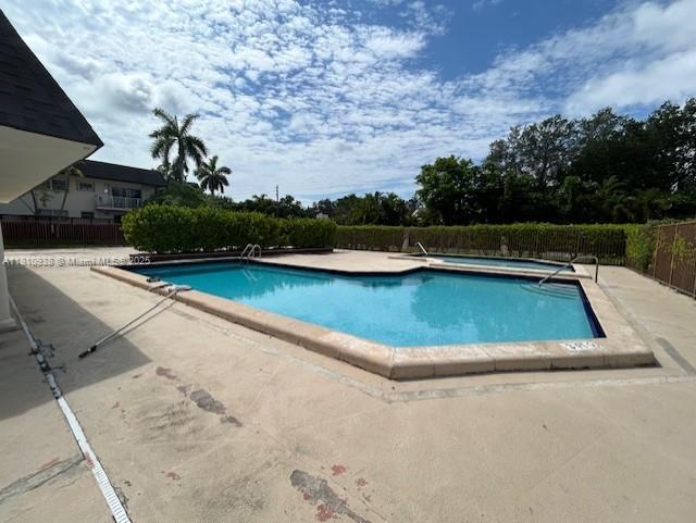 8475 SW 94th St Unit 116E, Miami, FL 33156 - community pool with a patio area