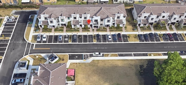 817 NE 211th St, Miami, FL 33179 - aerial view of property and surrounding area with nearby suburban area
