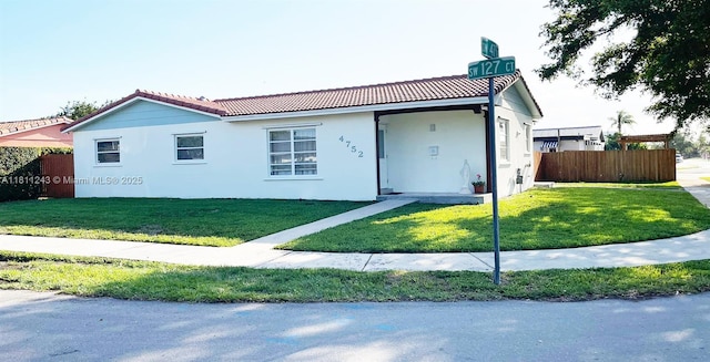 4752 SW 127th Ct, Miami, FL 33175 - ranch-style home featuring a tiled roof and stucco siding