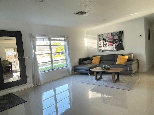 4752 SW 127th Ct, Miami, FL 33175 - tiled living room with baseboards