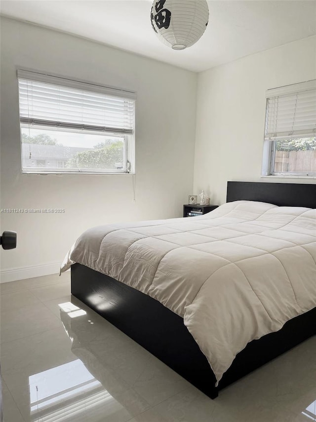 4752 SW 127th Ct, Miami, FL 33175 - bedroom with multiple windows and baseboards