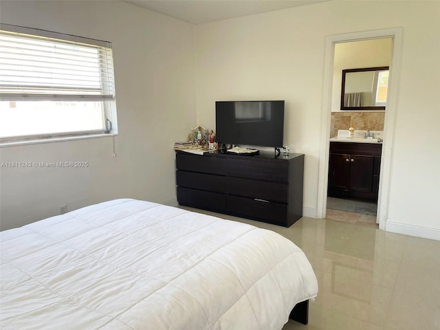 4752 SW 127th Ct, Miami, FL 33175 - bedroom featuring light tile patterned floors and ensuite bathroom