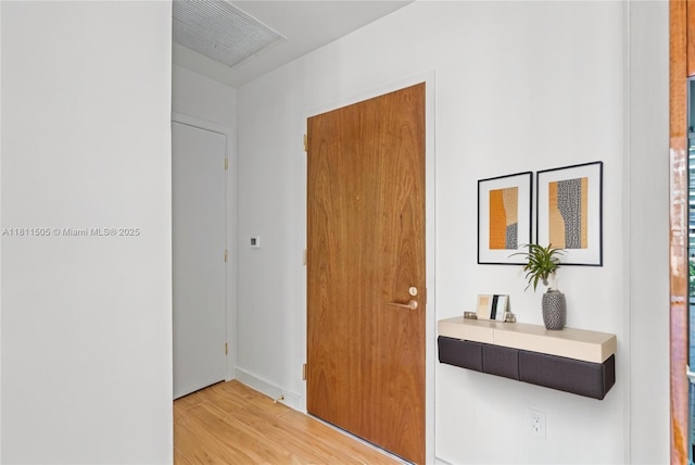 2678 Tigertail Ave Unit 513, Coconut Grove, FL 33133 - foyer with light wood-style floors and baseboards