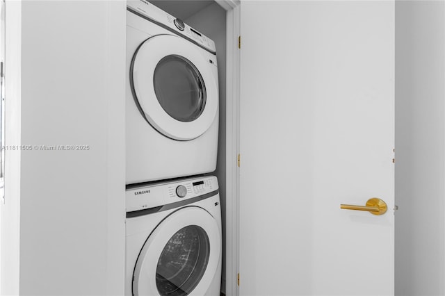 2678 Tigertail Ave Unit 513, Coconut Grove, FL 33133 - laundry room featuring stacked washing machine and dryer