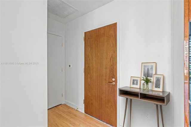 2678 Tigertail Ave Unit 513, Coconut Grove, FL 33133 - entrance foyer featuring wood finished floors and baseboards