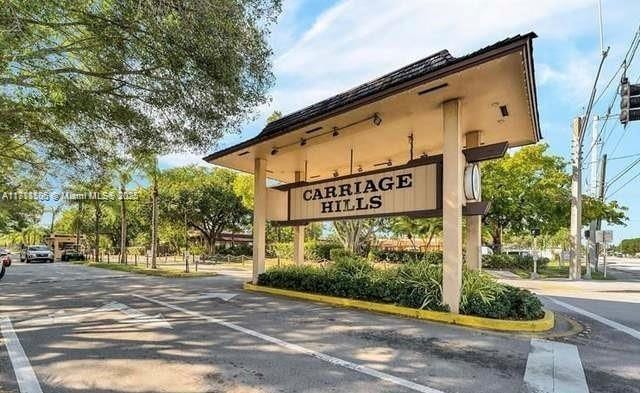 322 Briarwood Cir Unit 1-17, Hollywood, FL 33024 - view of community / neighborhood sign