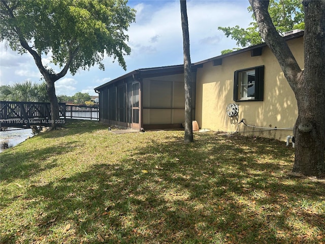 322 Briarwood Cir Unit 1-17, Hollywood, FL 33024 - view of yard with a sunroom
