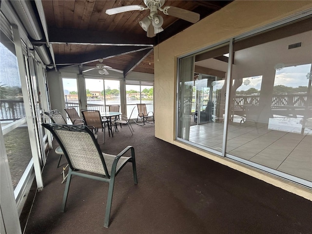 322 Briarwood Cir Unit 1-17, Hollywood, FL 33024 - sunroom / solarium featuring a ceiling fan and outdoor dining area