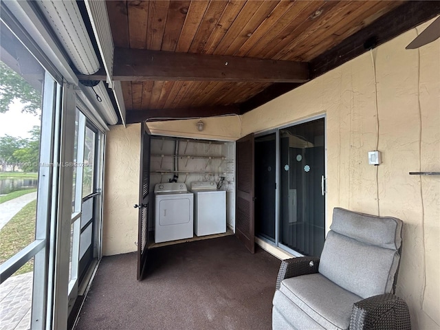 322 Briarwood Cir Unit 1-17, Hollywood, FL 33024 - unfurnished sunroom with washing machine and dryer, healthy amount of natural light, and beam ceiling