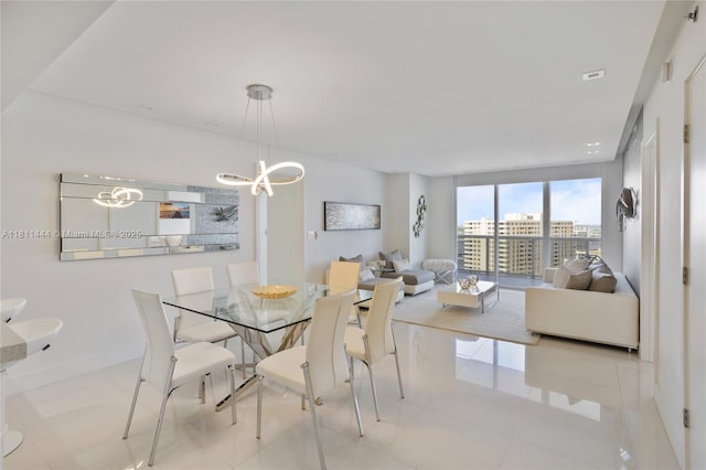 1800 S Ocean Dr Unit 1708, Hallandale Beach, FL 33009 - tiled dining area with a chandelier and baseboards