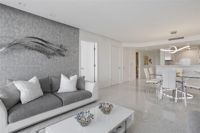 1800 S Ocean Dr Unit 1708, Hallandale Beach, FL 33009 - living area featuring a chandelier and light tile patterned floors