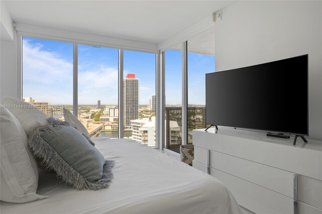 1800 S Ocean Dr Unit 1708, Hallandale Beach, FL 33009 - bedroom with multiple windows and a wall of windows