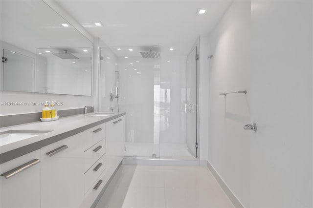 1800 S Ocean Dr Unit 1708, Hallandale Beach, FL 33009 - full bathroom with a shower stall, recessed lighting, double vanity, tile patterned flooring, and baseboards
