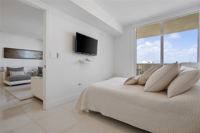 1800 S Ocean Dr Unit 1708, Hallandale Beach, FL 33009 - bedroom with light tile patterned floors and baseboards