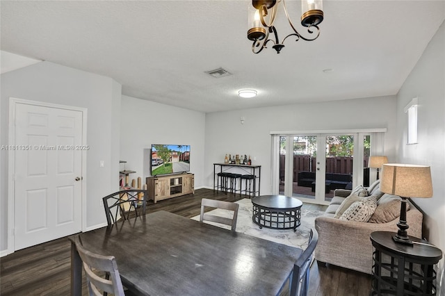 1001 NW 100th Ave, Pembroke Pines, FL 33024 - dining room with dark wood-type flooring, a chandelier, and french doors