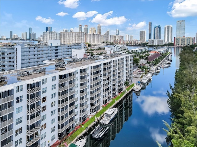 3660 NE 166th St Unit 603, North Miami Beach, FL 33160 - aerial view of skyline, a nearby body of water, and apartment complex / building