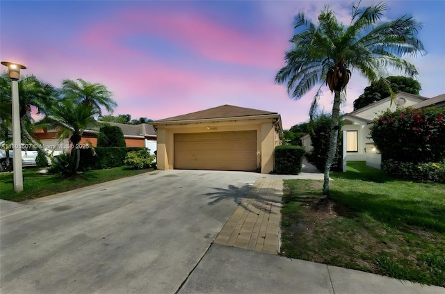 3831 NW 21st St, Coconut Creek, FL 33066 - single story home featuring a garage, stucco siding, and a lawn