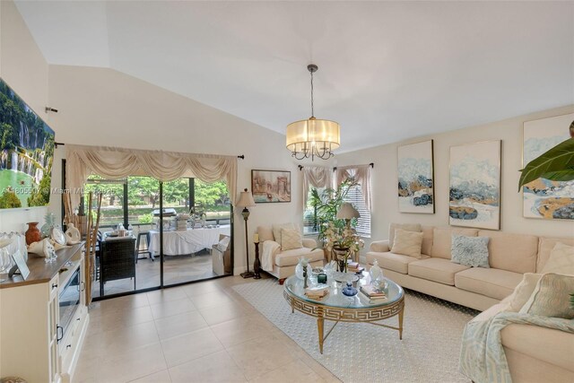 3831 NW 21st St, Coconut Creek, FL 33066 - living room with lofted ceiling, plenty of natural light, a chandelier, and light tile patterned floors