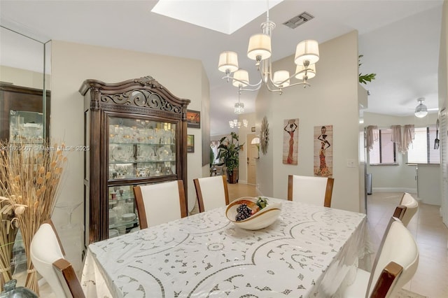 3831 NW 21st St, Coconut Creek, FL 33066 - tiled dining space featuring a chandelier and a skylight