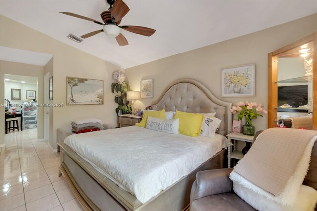 3831 NW 21st St, Coconut Creek, FL 33066 - bedroom with light tile patterned floors, vaulted ceiling, and ceiling fan