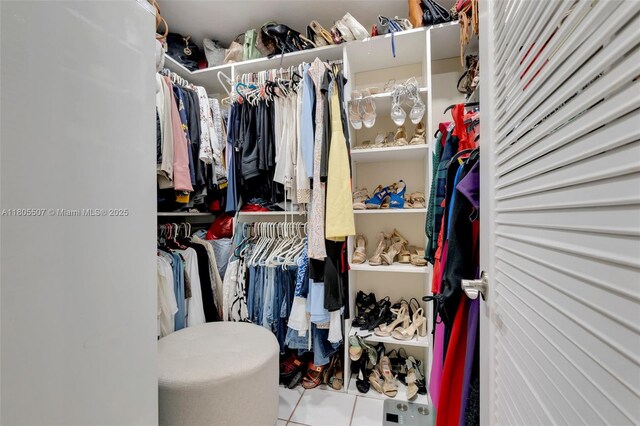 3831 NW 21st St, Coconut Creek, FL 33066 - spacious closet featuring tile patterned flooring