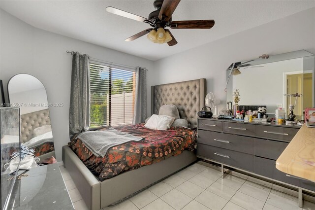 3831 NW 21st St, Coconut Creek, FL 33066 - bedroom featuring light tile patterned flooring and a ceiling fan