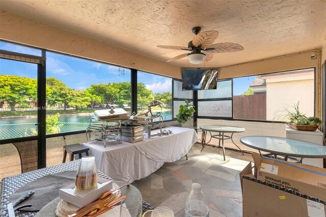 3831 NW 21st St, Coconut Creek, FL 33066 - sunroom / solarium featuring ceiling fan and outdoor dining space