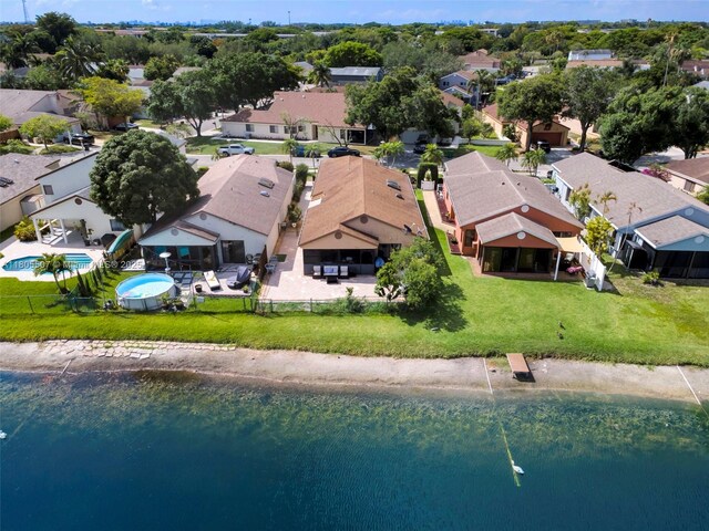 3831 NW 21st St, Coconut Creek, FL 33066 - aerial perspective of suburban area with a nearby body of water