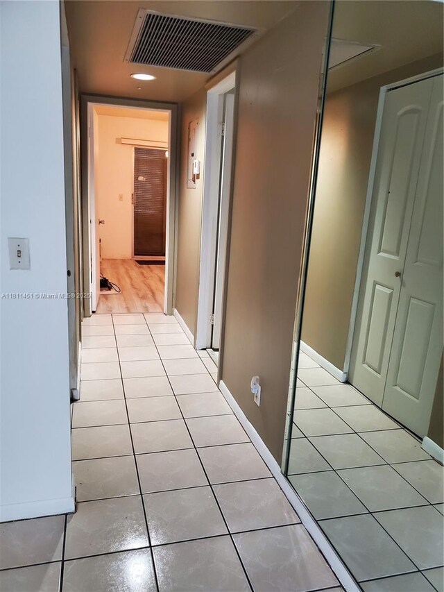 800 SW 131st Ave Unit 113F, Pembroke Pines, FL 33027 - corridor with light tile patterned floors