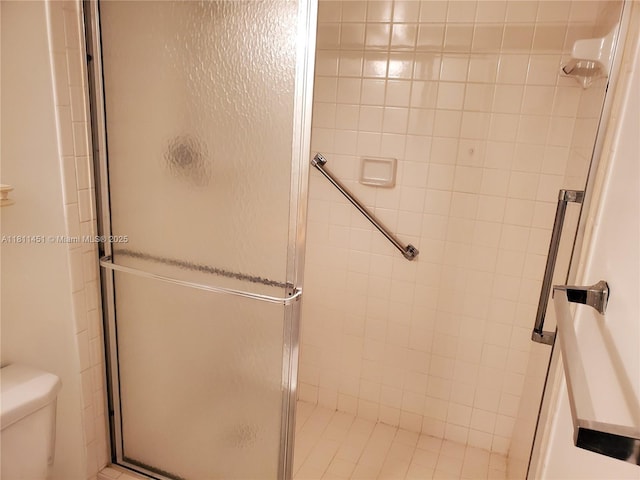 800 SW 131st Ave Unit 113F, Pembroke Pines, FL 33027 - bathroom featuring a shower stall and toilet