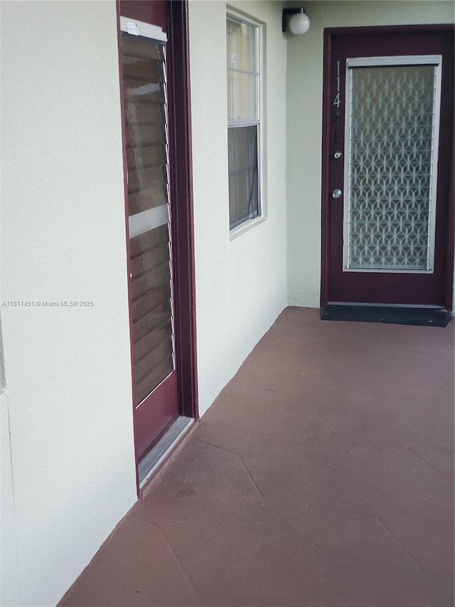 800 SW 131st Ave Unit 113F, Pembroke Pines, FL 33027 - doorway to property featuring stucco siding