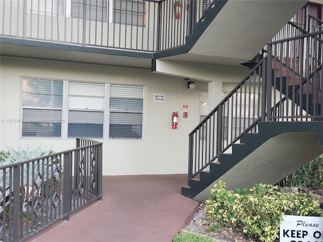 800 SW 131st Ave Unit 113F, Pembroke Pines, FL 33027 - doorway to property with stucco siding