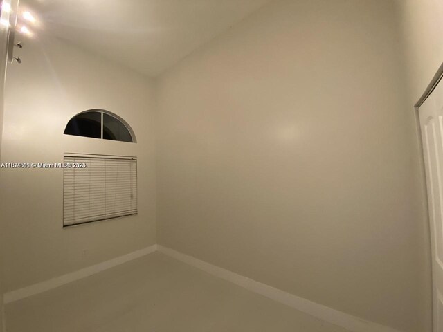 1371 NE 42nd Ave, Homestead, FL 33033 - spare room featuring lofted ceiling