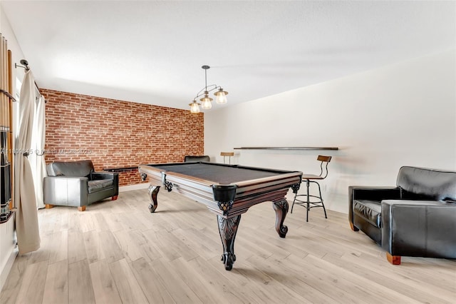 651 E Lake Dasha Dr, Plantation, FL 33324 - playroom featuring brick wall, pool table, and light wood-type flooring