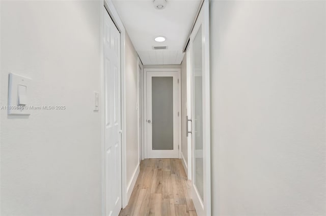651 E Lake Dasha Dr, Plantation, FL 33324 - hallway with light wood-style flooring and baseboards