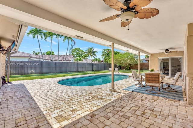 651 E Lake Dasha Dr, Plantation, FL 33324 - view of swimming pool with a ceiling fan, a patio area, and outdoor dining space