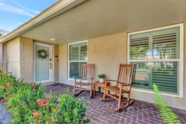 651 E Lake Dasha Dr, Plantation, FL 33324 - doorway to property featuring stucco siding