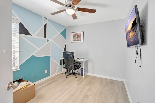 5565 SW 43rd St, Davie, FL 33314 - office with wood finished floors, baseboards, and a ceiling fan