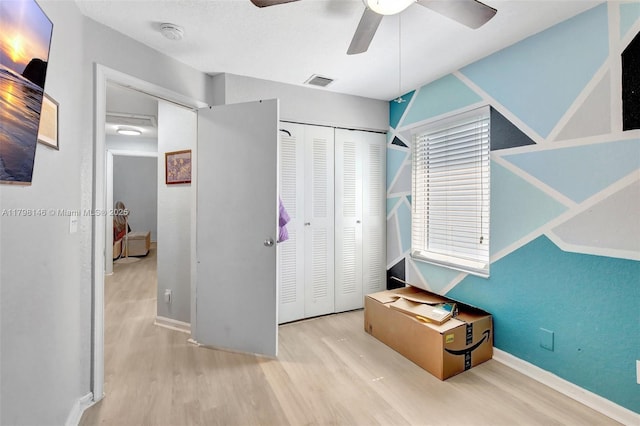 5565 SW 43rd St, Davie, FL 33314 - bedroom with wood finished floors, baseboards, a closet, and ceiling fan