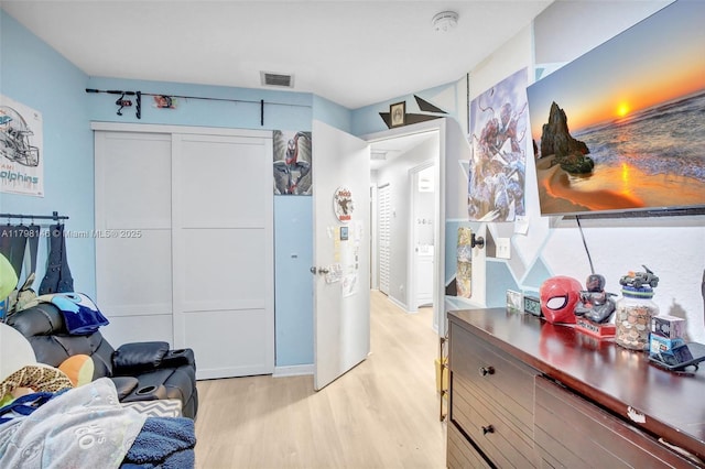 5565 SW 43rd St, Davie, FL 33314 - bedroom featuring light wood-style flooring and a closet