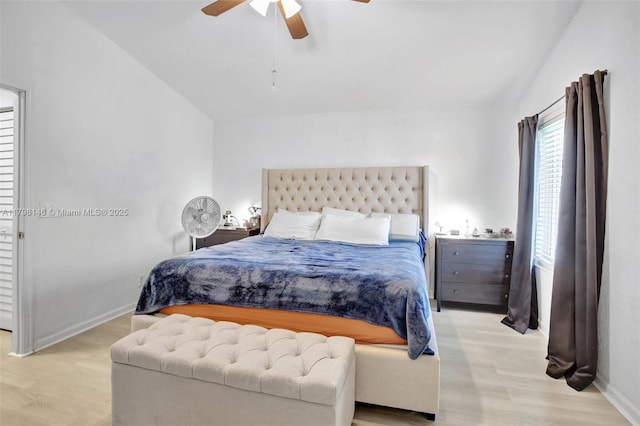 5565 SW 43rd St, Davie, FL 33314 - bedroom featuring wood finished floors, lofted ceiling, ceiling fan, and baseboards